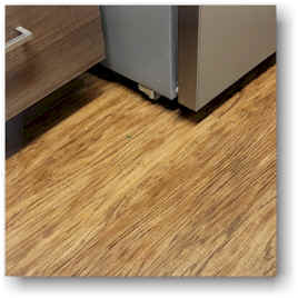 Vinyl Plank Flooring in a Kitchen - Carpetprofessor.com